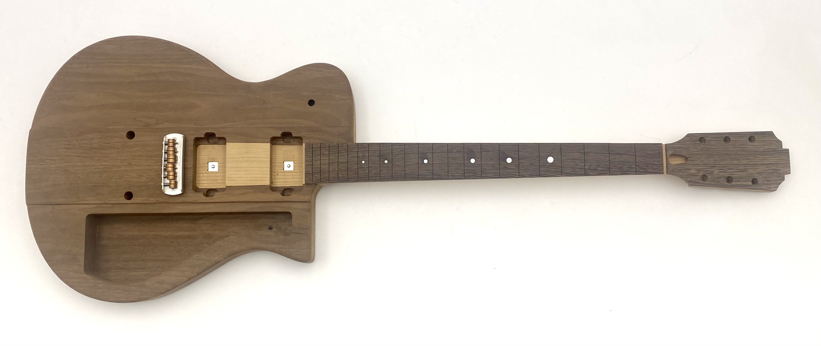 Artifact Bolt-Through™ neck joint, extended heel beneath the pickups