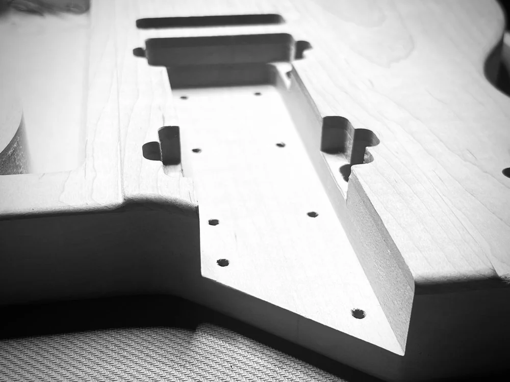 Black-and-white detail of the extended Artifact neck pocket